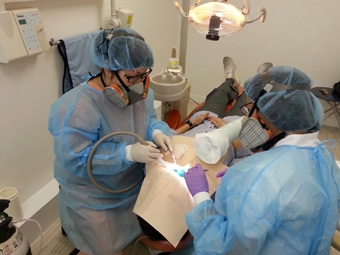 Dr. Tong performing surgery